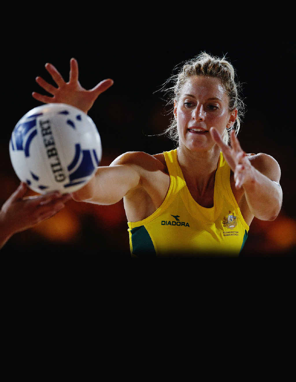 Allora netballer Laura Geitz passes the ball out during the Preliminary Round Group B match between Australia and Wales at SECC Precinct during the Glasgow 2014 Commonwealth Games last week. Allora netballer Laura Geitz passes the ball out during the Preliminary Round Group B match between Australia and Wales at SECC Precinct during the Glasgow 2014 Commonwealth Games last week.
